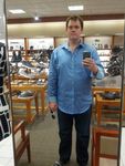 me in blue shirt shoe shopping